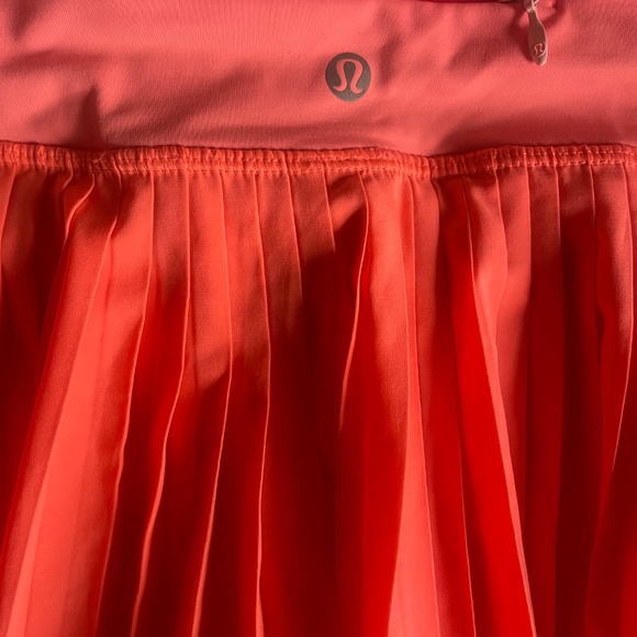 Lululemon Pleat to Street II Skirt “Grapefruit” - Picture 2 of 2
